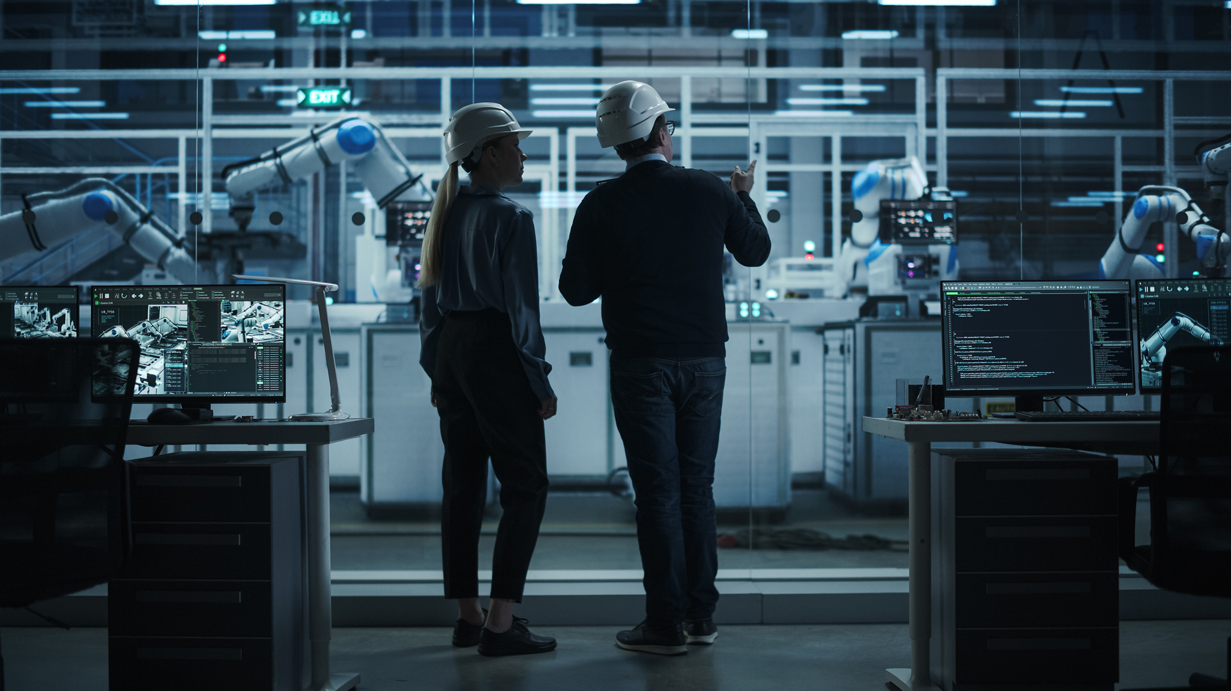 Engineers having a conversation at tech electronics factory